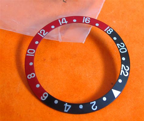 genuine rolex gmt bezel insert